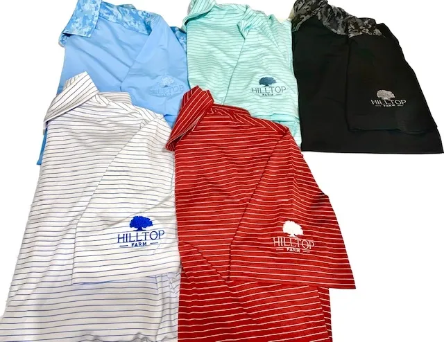 Five striped polos embroidered with the Hilltop Farm logo